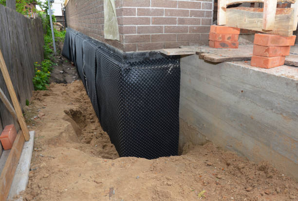 Happy homeowners after waterproofing job in Leipsic